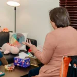 Adult patient during a psychological evaluation session for ADHD in Tucson, discussing attention, memory, and daily functioning concerns with a mental health provider.